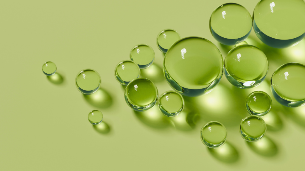 Small, medium and large glass balls randomly connected.